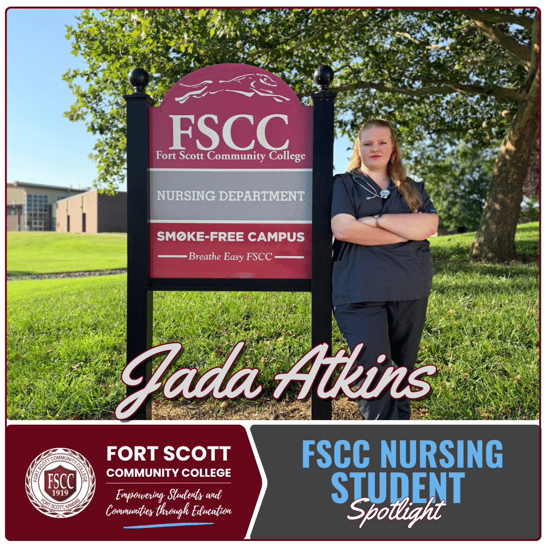 Jada Atkins, a Fort Scott Community College nursing student, stands confidently in navy blue scrubs beside the FSCC Nursing Department sign on campus. She has her arms crossed and a stethoscope around her neck, with trees and campus buildings in the background. The graphic features her name in large script across the lower center and includes the text "FSCC Nursing Student Spotlight" along with the Fort Scott Community College logo and the college's tagline, "Empowering Students and Communities through Education."