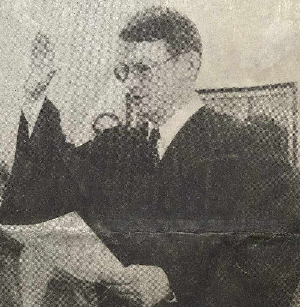 Photo of Judge Gerald Hart from the bench