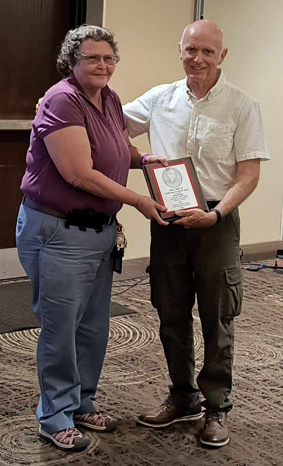 Photo of Helen Holm receiving award