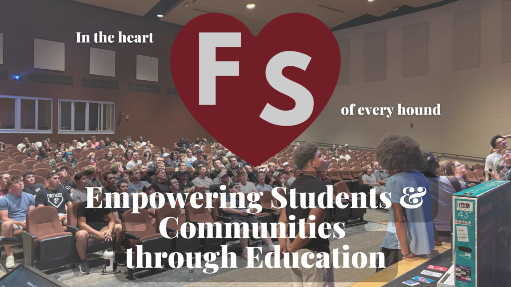 In the Heart Web Photo of a packed FSCC auditorium with students and staff, overlaid with a heart-shaped FS graphic and the words “In the heart of every hound — Empowering Students & Communities through Education.