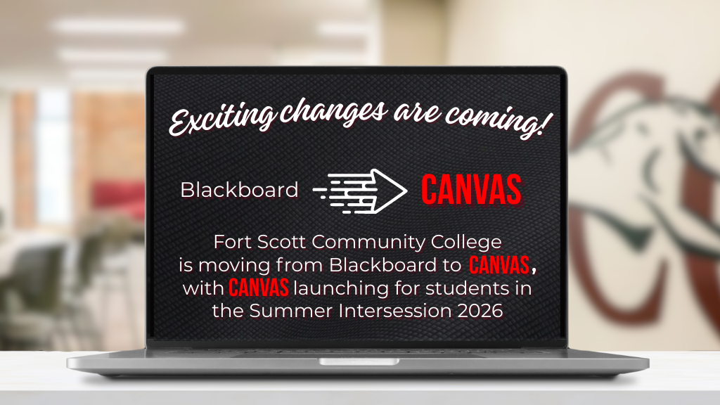 Laptop on a desk displaying a slide that reads ‘Exciting changes are coming! Blackboard arrow pointing to CANVAS. Fort Scott Community College is moving from Blackboard to CANVAS, with CANVAS launching for students in the Summer Intersession 2026,’ with a blurred campus background.